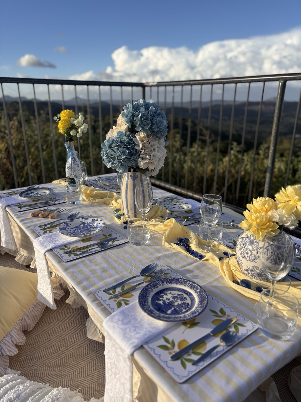 Luxury picnic at Duloong Lookout with cushions and grazing