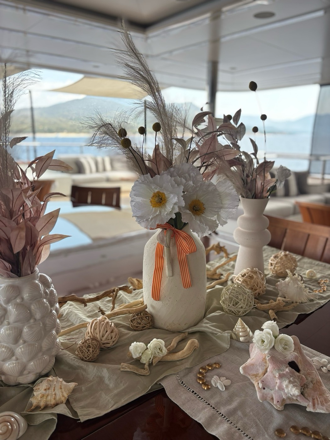 Coastal tablescape with linen and candlelight
